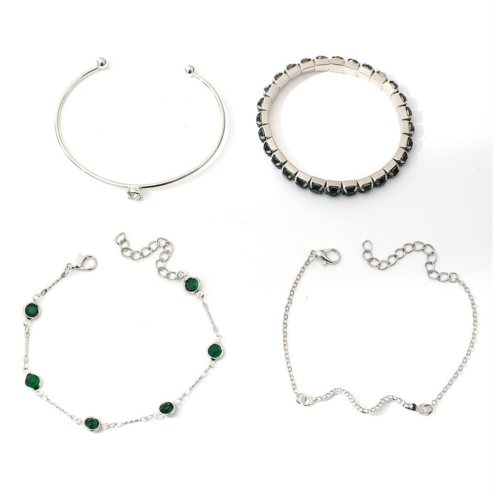 Sorina Feldwyn Set elegante de pulseras doradas