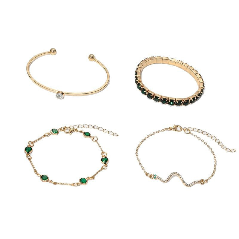 Sorina Feldwyn Set elegante de pulseras doradas